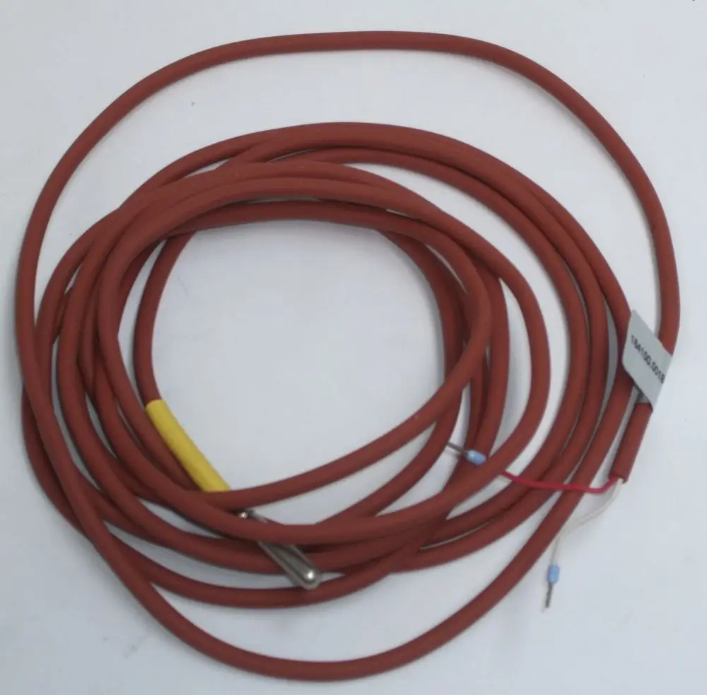 Kabel mit rotem Gummiüberzug, zwei Drähten, einem Sensor und einer Markierung. Möglicherweise ein Zubehörteil für Daikin Heizsysteme.